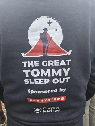 The Great Tommy Sleep Out logo on the back of a jumper
